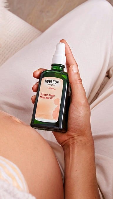 Těhotenský pěsticí olej na strie